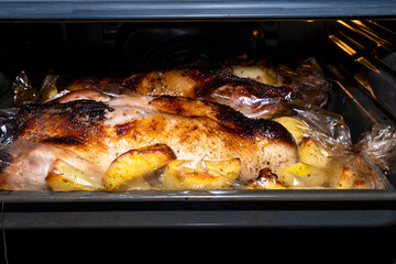 Roasted duck in the oven.