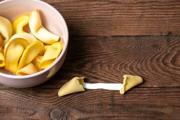 Fortune cookies on a wooden background. Concept of luck, lottery. Chinese New Year. Lots of free space.