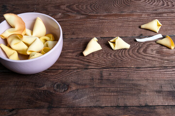 Fortune cookies on a wooden background. Concept of luck, lottery. Chinese New Year. Lots of free space.