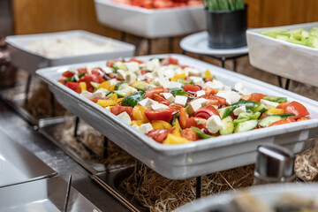 Catering meals prepared for guests at a wedding or hotel dinner. Healthy salads and other...