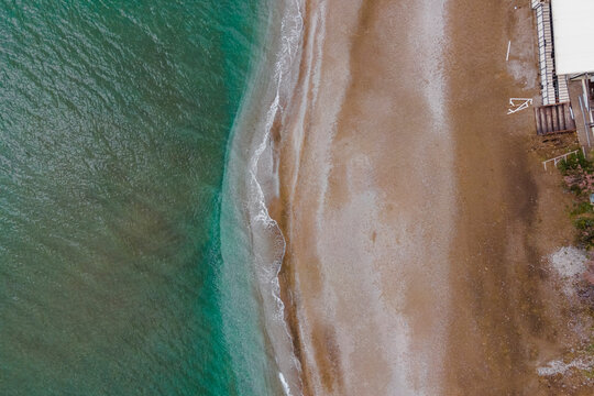 Aerial view of an empty beach along the Thracian Sea, Makri, East Macedonia and Thrace, Greece.