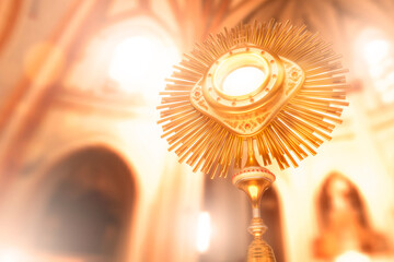 A monstrance containing the consecrated host being displayed in a church. Corpus Christi. Eucharist. 3D Illustration - obrazy, fototapety, plakaty