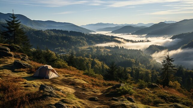  a tent set up on top of a mountain with a view of a valley and a valley in the distance.