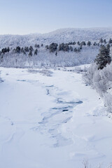 Frozen river in Abisko Nationalpark in winter scenery. Sweden, Arctic Circle, Swedish Lapland