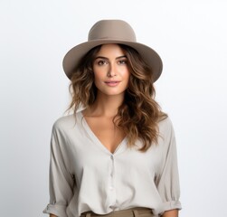 woman wearing hat in studio portrait