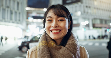 Travel, smile and face of Asian woman in the city on exploring vacation, adventure or holiday....