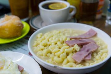 Soup of macaroni with ham