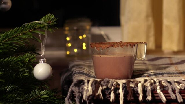 Pouring Hot Chocolate drink in Christmas festive scene 