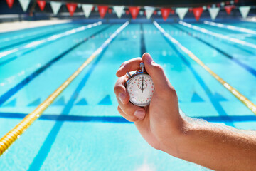 Hand, stopwatch and swimming pool for sport, training and workout with preparation for competition. Person, coach or mentor with clock, timer or watch for speed, progress and tracking lap for race - obrazy, fototapety, plakaty