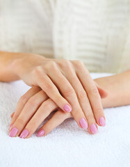 Close up shot of nicely manicured woman fingernails