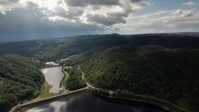 Aerial drone video of flight over the lake in Bad Lauterberg Germany.