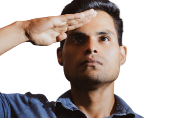 a young man in a military salute gesture on a white background. Isolated