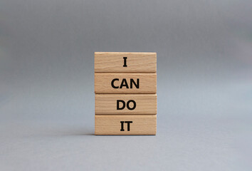 I can do it symbol. Concept words I can do it on wooden blocks. Beautiful grey background. Business...