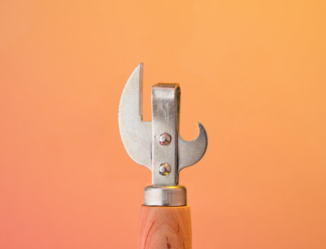 Jar opener with wooden handle. Cooking idea.