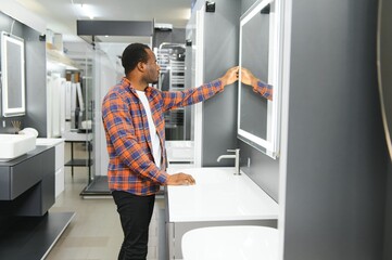 african american at the building market looking for sink into their bathroom