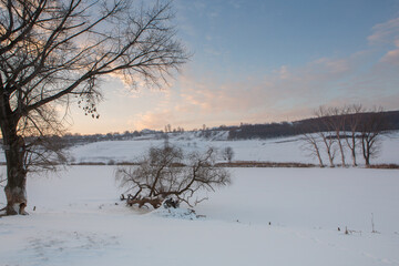 Frosty winter in Russia. Beautiful sunrise in Siberia. 
Cold winter photo.
