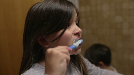 Young Girl Engaged in Nightly Dental Care - Preparing for Bed with Toothbrushing Routine, kid...