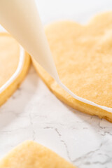 Heart-shaped sugar cookies with royal icing