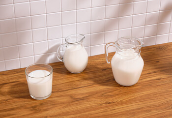Fresh white cow's milk on the table. Proper nutrition, breakfast or lunch.