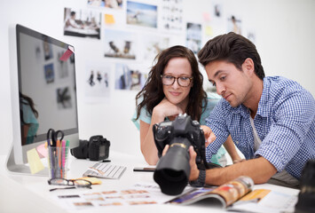 Man, woman or camera for workshop photography with teamwork, lens and creative editor in workplace. People, photographer and collaboration in career, technology or focus in office on digital graphic