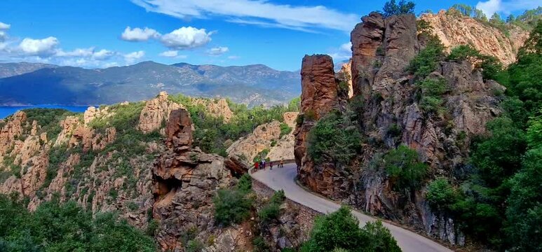 Nature of Corsica, France. beautiful red rocks of Calanques de Piana. famous route and travel destination in west coast of the island in gulf of Porto
