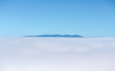 San Francisco hills over the clouds. Low cloud visibility.