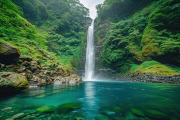 Waterfall in the green forest on the island of Maui, Hawaii