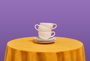White cups and plates. Modern dinnerware, cups and plates. Drinking and fun mood.
