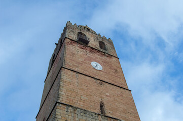 Fototapeta na wymiar Tower with clock of the Cathedral of Siguenza, province of Guadalajara. Spain