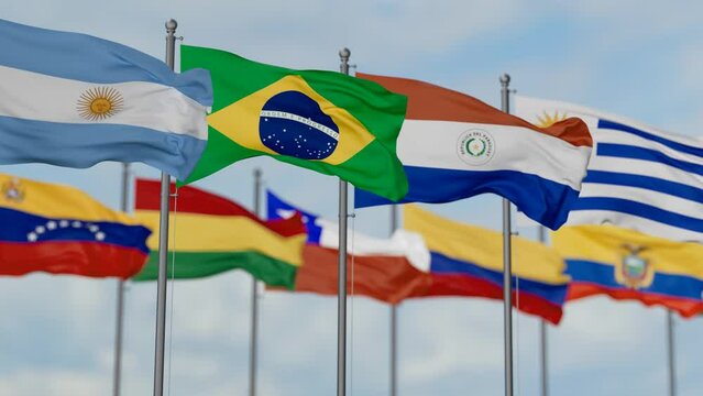 Mercosur or Southern Common Market flags waving together on cloudy sky, endless seamless loop