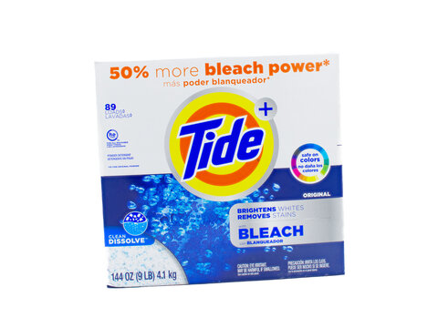 Ocala, Florida USA January 2, 2024 Tide plus with bleach brightens whites removes stains clean dissolve.  Cardboard box packaging with orange and blue colors isolated on white background