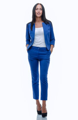 Confident young businesswoman standing with hands in pocket, loo