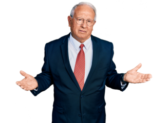 Senior man with grey hair wearing business suit and glasses clueless and confused with open arms, no idea concept.