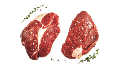 Obraz premium Two raw beef steaks isolated on transparent background. Top view.