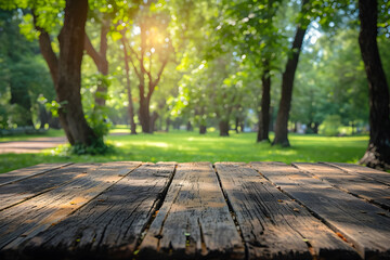 Naklejka na ściany i meble Empty Wooden Tabletop with Blurry Green Park Background
