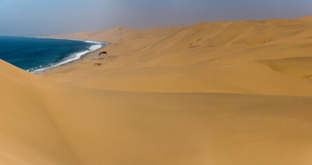 Fototapeta na wymiar huge dunes at Sandwich Harbour, Namibia