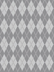 Argyle gray print. Seamless knitted pattern with rhombuses. Checkered background in gray and white colors. Vector illustration