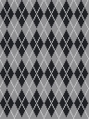 Argyle gray print. Seamless knitted pattern with rhombuses. Checkered background in gray, black and white colors. Vector illustration