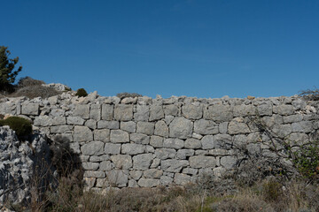 Fototapeta na wymiar stone wall with sky