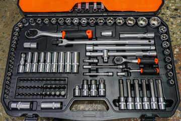 Universal tool box, tool kit with set of hex, torx and screwdriver bits and ratchet wrench sockets