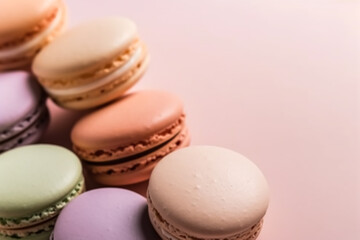 Obraz premium Macaroons on cream pastel background, chic cafe dessert, sweet food and holiday cake macaron for luxury confectionery, generative ai