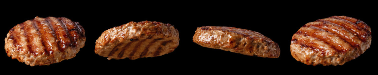 Falling grilled hamburger meat isolated on black background