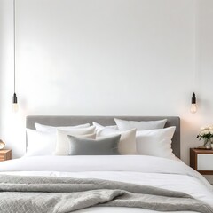 White cozy bed and pillows in modern bedroom