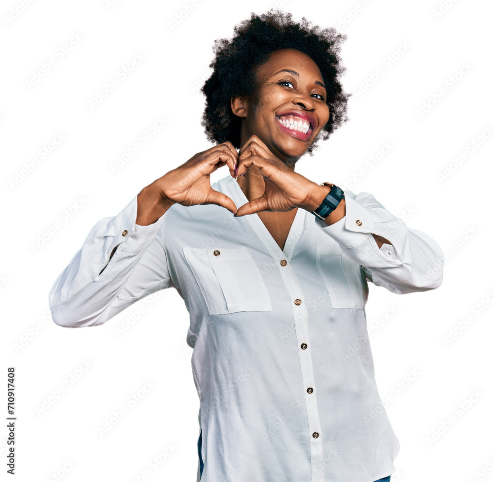 Sticker african american woman with afro hair wearing casual white t shirt smiling in love doing heart symbo