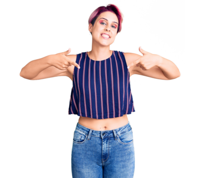 Young beautiful woman with pink hair wearing casual clothes looking confident with smile on face, pointing oneself with fingers proud and happy.