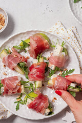 Appetizer with pear, blue cheese and prosciutto ham for holidays