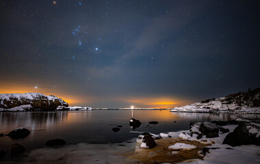 A beautiful starry night in winter landscape
