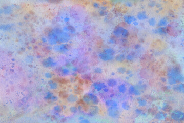 Multi-colored splashes of watercolor paint on a white background, colorful abstract background for design