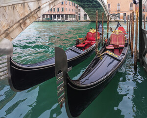 Gondolas in Venice, Italy. Popular tourist attraction © Natalia
