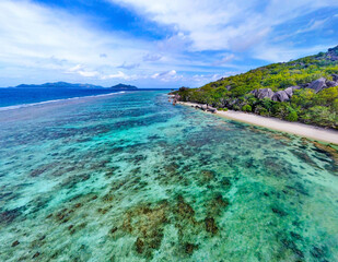 Fototapeta premium Aerial view of Anse Source d'Argent beach coral reef